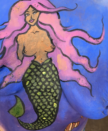 Mermaid painted on a ladies breast