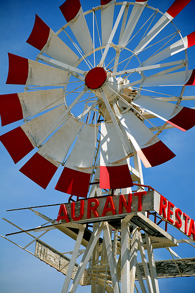  windmill truns gently in the breeze in rural South Dakota