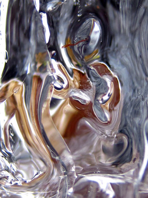 a goddess appears in swirling water